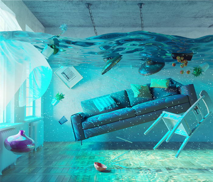 Furniture underwater in residential home's living room