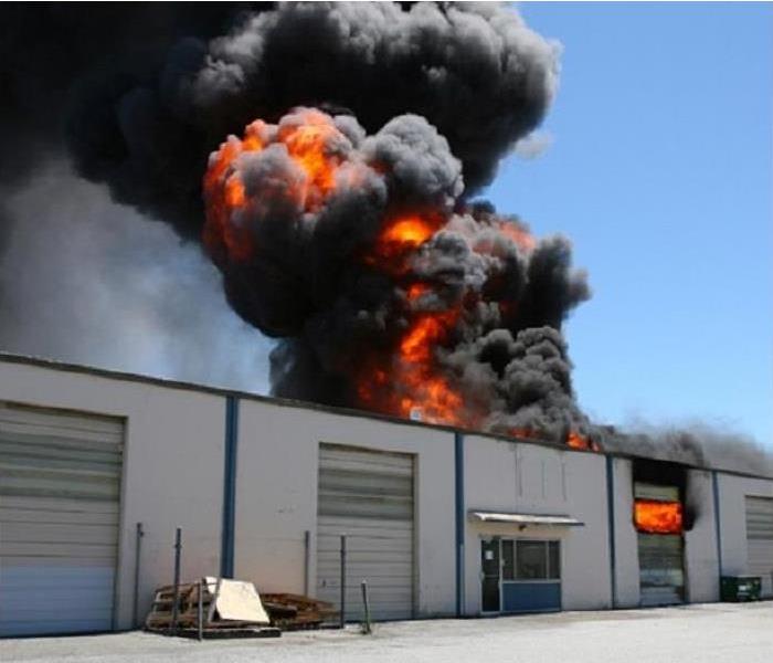 commercial warehouse in flames